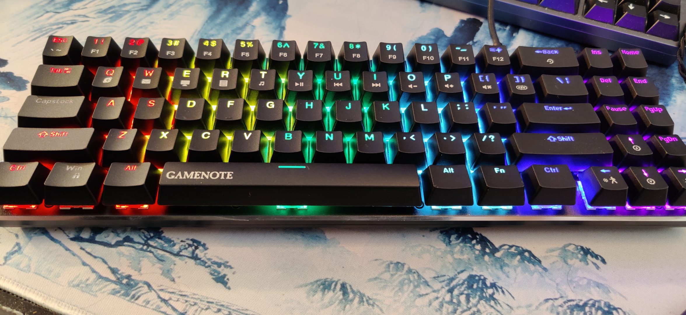 Havit KB512L "Gamenote" keyboard displaying rainbow LED lighting.